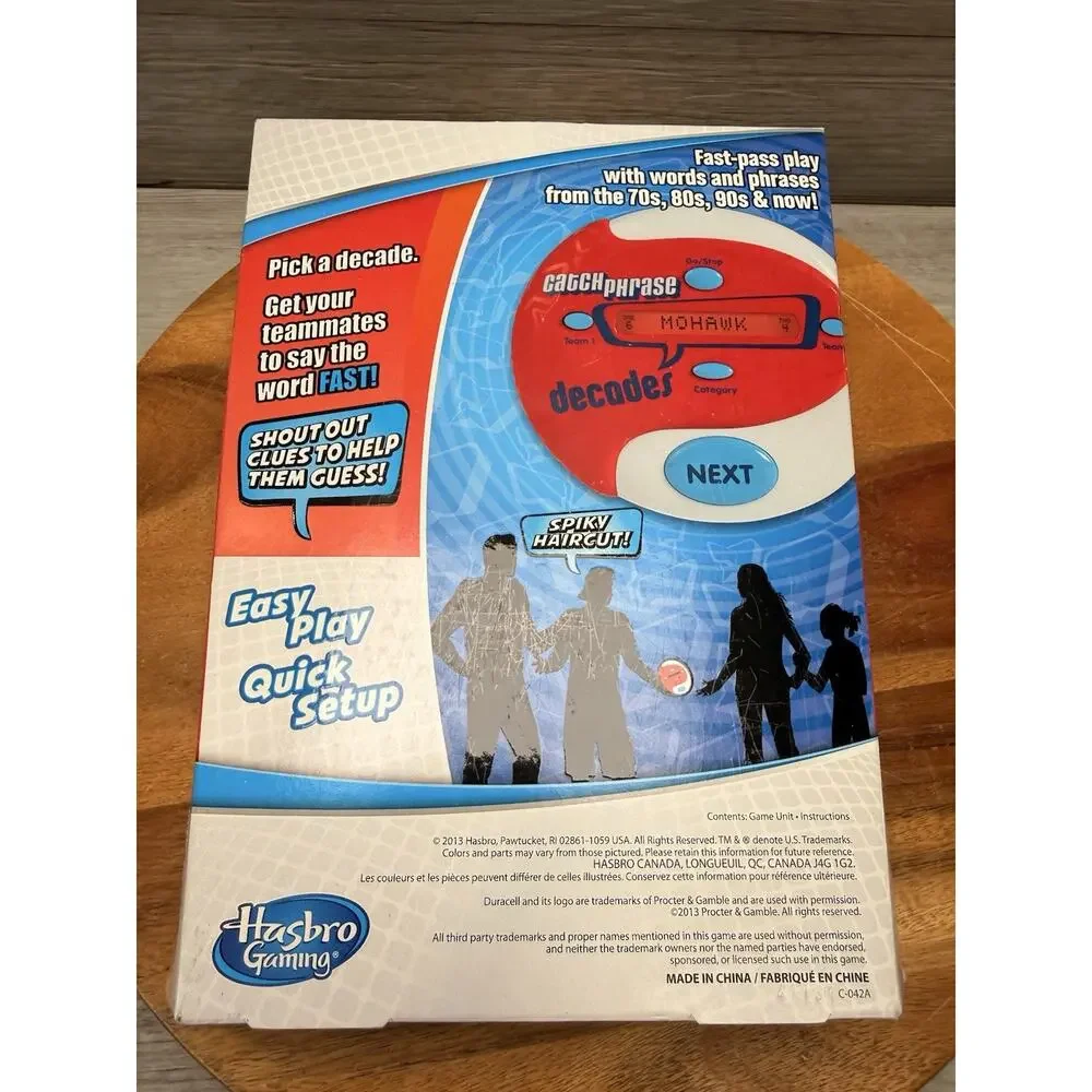 Hasbro Gaming Electronic Catch Phrase Decades Pass & Party Game 2013